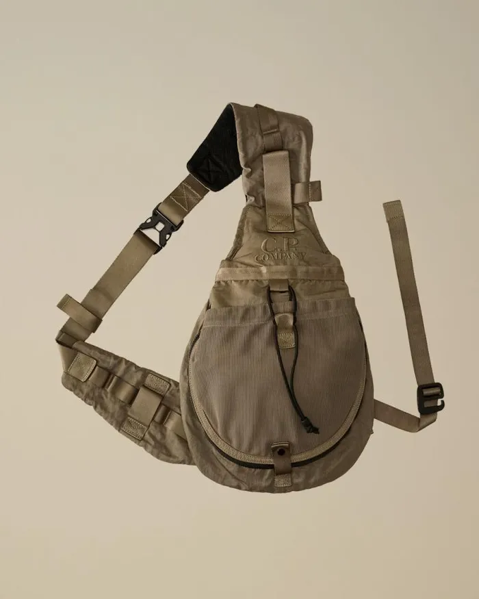 CP Company Backpacks and Waistbag Nylon B Crossbody Mesh Rucksack Walnut Beige 8211 Man CP Company Backpacks and Waistbag Nylon B Crossbody Mesh Rucksack Walnut Beige 8211 Man
