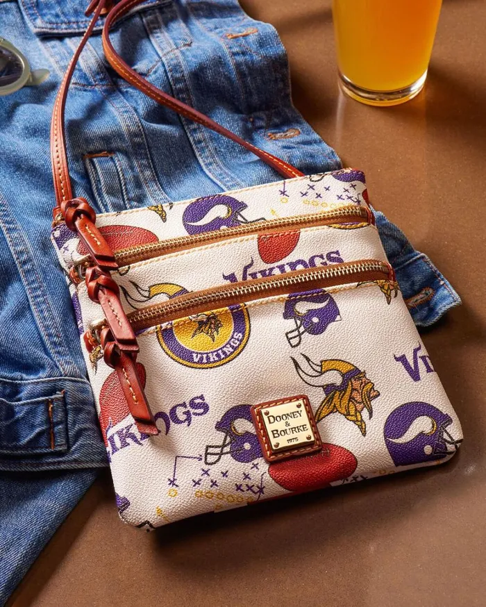 NFL Vikings North South Triple Zip Crossbody Vikings Women Dooney and Bourke Crossbodies NFL Vikings North South Triple Zip Crossbody Vikings Women Dooney and Bourke Crossbodies